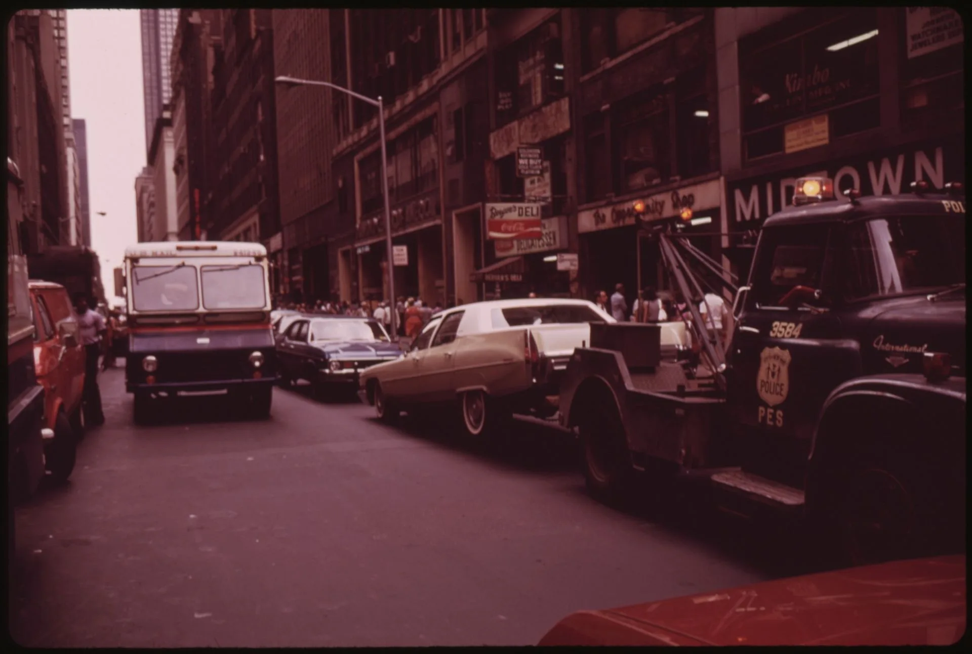 NEW YORK POLICE TOW TRUCK REMOVES ILLEGALLY PARKED CADILLAC. Towtruck roadside in NYC: permit classes and eligible calls