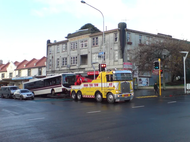 A tow truck for buses on Park Road, Auckland City , New Zealand . Looking southeast. Getting on a Texas police towing rotation list