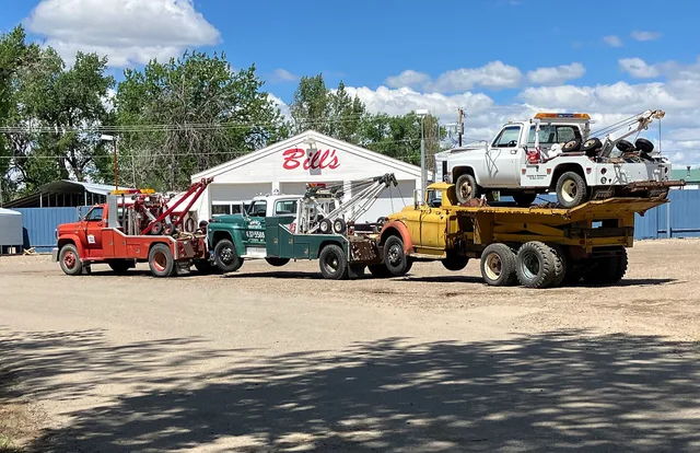 Tow truck towing a tow truck towing a tow truck hauling a tow truck. A working business plan for a towing company
